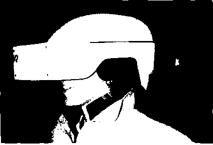 Шлем, который используется в системах виртуальной реальности (перепечатано с разрешения компании Virtual Research)